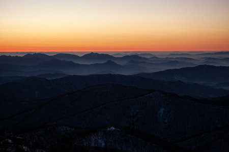 Mountain landscape at sunrise. View from the top of the mountain.の写真素材