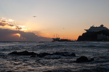Sea landscapes and rough waves featuring sailing ships on the sea.の写真素材