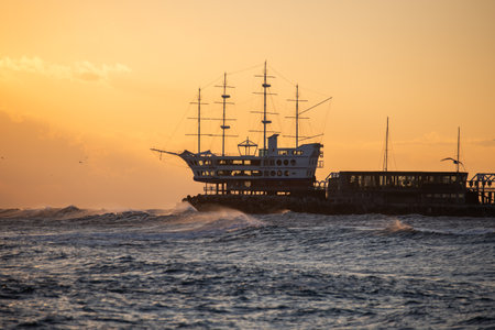 Sea landscapes and rough waves featuring sailing ships on the sea.の写真素材