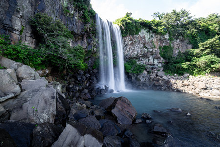 The scenery of Jeju Island, where the waterfall falls to the cliff is beautifulの写真素材