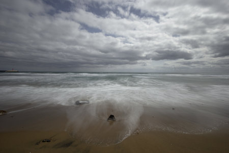 Spectacle Localized Rainstorms and Traces of Rough Waves, Long Exposure Photographsの写真素材