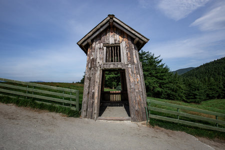 green pastures and farm sheds under clear skiesの写真素材