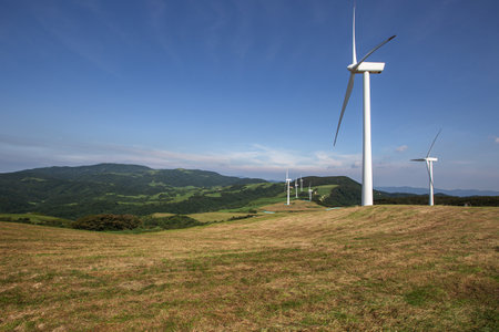 The scenery of Daegwallyeong Ranch with wind turbines along the endless mountainsの写真素材