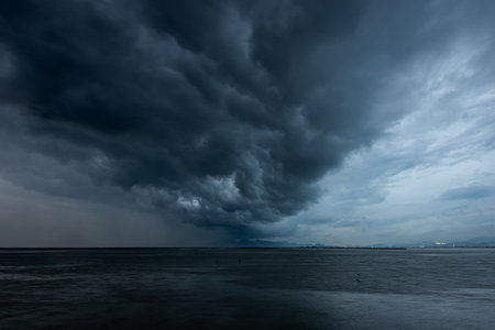Dramatic stormy sky over the sea. Natural background.の写真素材