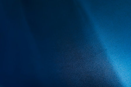 abstract blue background texture with some smooth lines and spots in itの写真素材