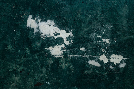 Grunge green background with white spots. Texture for design.の写真素材