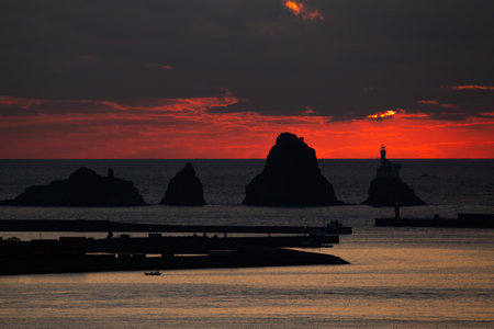 side-by-side islands and sea sunrise sceneryの写真素材