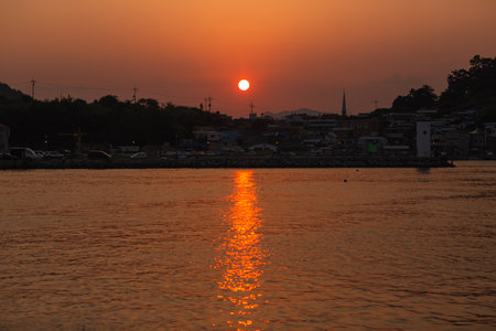 Sunset scenery above the island townの写真素材