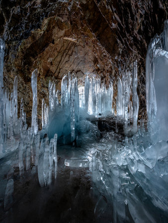 icicles created in a dark caveの写真素材