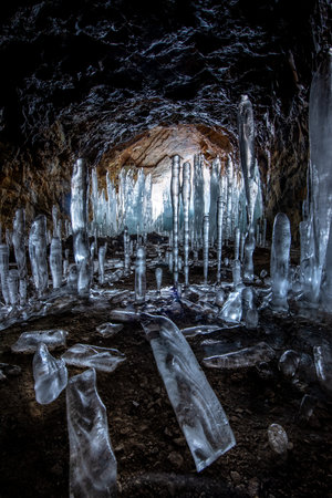 icicles created in a dark cave