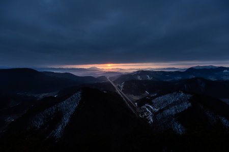 sunrise in the mountains, view from the top of the mountainの写真素材
