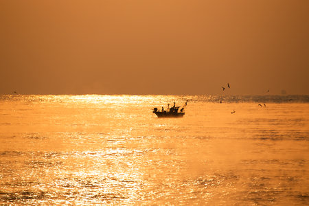 a boat on the sea full of water fogの写真素材