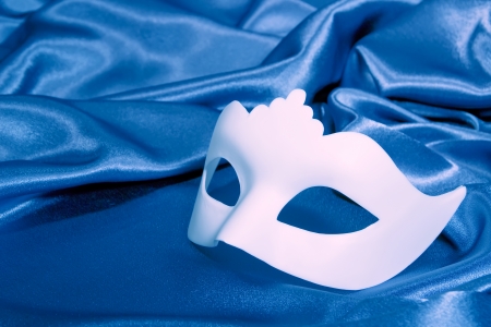 Carnival mask white unisex against the blue theater の写真素材