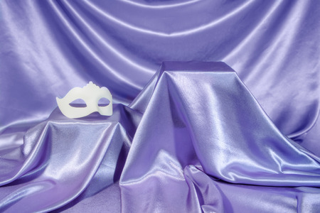 Carnival mask white unisex against the background blue theater の写真素材