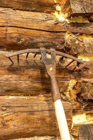 Rake the old log walls  close-upの写真素材