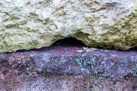 Natural stone gravel yellow green old background textureの写真素材