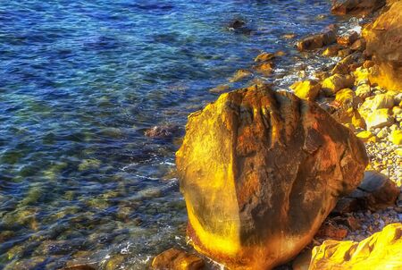 Rocky coast  sea coast Sochi Krasnodar region Russia transparent water bright sunlightの写真素材