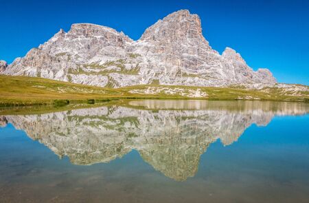 Lake in Tre cime peaks in Dolomitesの写真素材