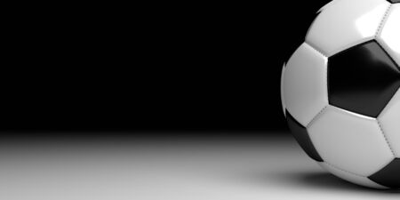 Side of soccer ball with black fading in the backの写真素材