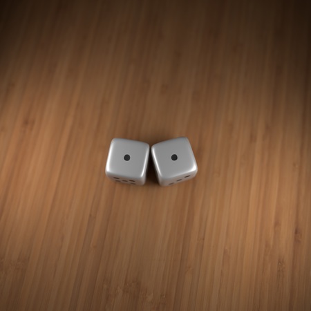 Snake eyes dice on woodの写真素材