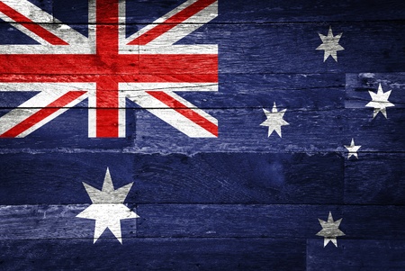 australia flag painted on old wood backgroundの写真素材