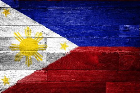 philippines flag painted on old wood backgroundの写真素材