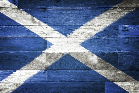 scotland flag painted on old wood backgroundの写真素材