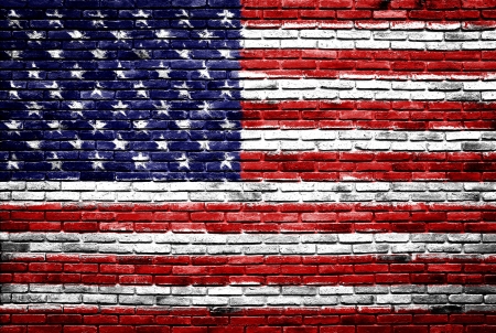 united states of america flag painted on old brick wall texture backgroundの写真素材