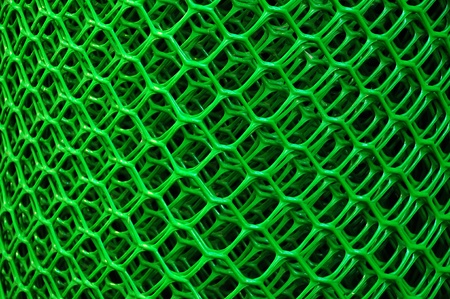 Roll of a green plastic net for a fence backgroundの写真素材