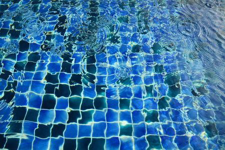Swimming water pool bule tiles backgroundの写真素材