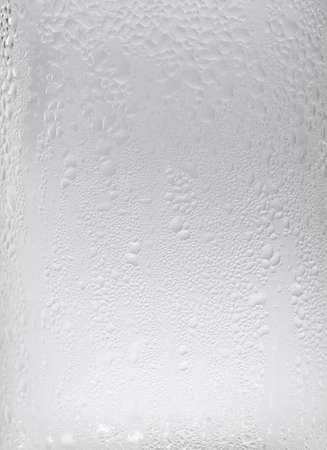 Water drops on the glass backgroundの写真素材