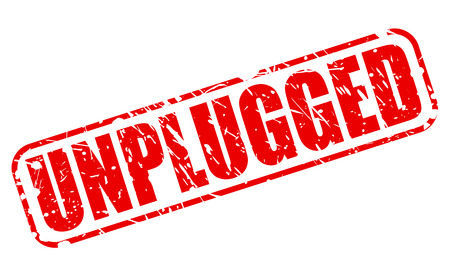 UNPLUGGED red stamp text on whiteの写真素材