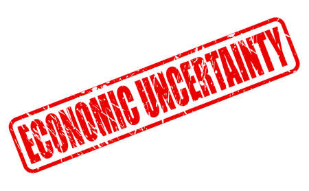 ECONOMIC UNCERTAINTY red stamp text on whiteの写真素材