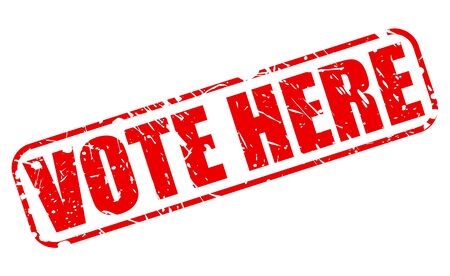 Vote here red stamp text on whiteの写真素材