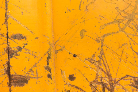 Grunge yellow metal texture backgroundの写真素材