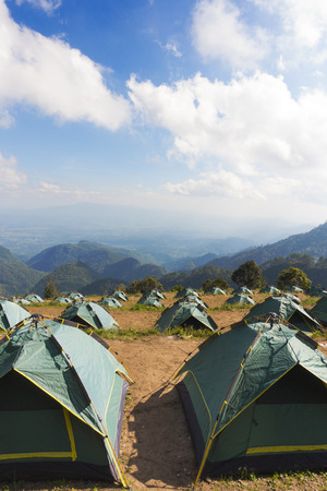 Many Tents on the mountain and blue sky view backgroundの写真素材