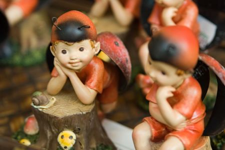 Decoration child fairy, looking at the snailの写真素材