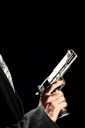 young men with chromed pistol,posterised