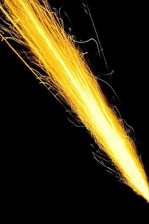 abstract yellow sparks of light with black background, abstract series