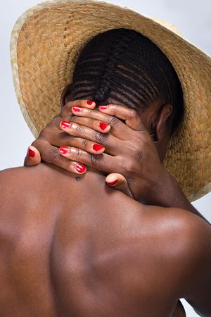 afro hairstyle, young beautiful African American girl with hat, people diversity seriesの写真素材