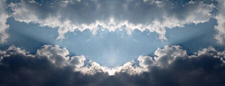 Symmetrical row of clouds, skyscapeの写真素材