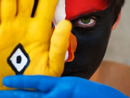 young man with a clown look, painted face, の写真素材