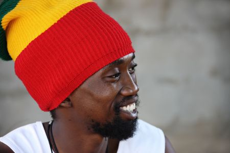 portrait of young rasta man in traditional clothesの写真素材