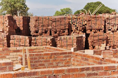 construction site, brickwork, few walls, against the skyの写真素材