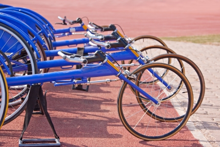Sports competition for abled and disabled athletes games, racing bikes wheelchairsの写真素材