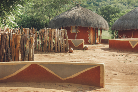 Traditional round African houses with thatched roof