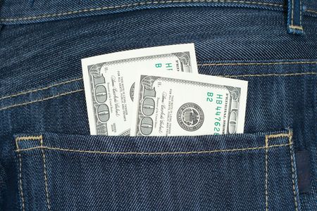 Two hundreds dollars in a back pocket of trousersの写真素材