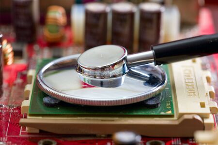 Stethoscope on the processor of a mainboardの写真素材