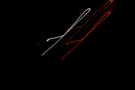 Lines of lights on a black backgroundの写真素材