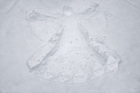 an angel in the snowの写真素材